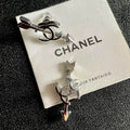 Chanel Silver-Tone Arrow CC Motif Stud Earrings