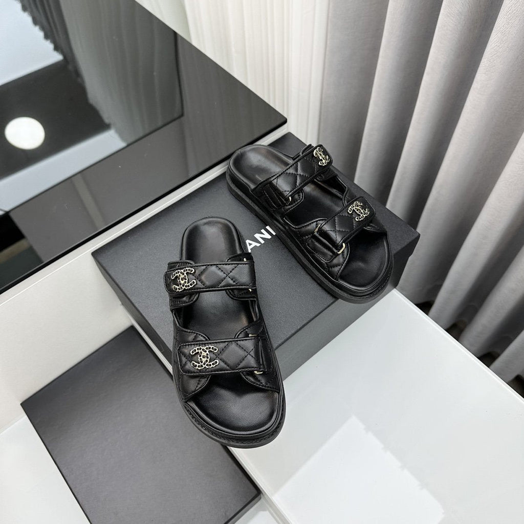 CHANEL dad sandals black lambskin mules